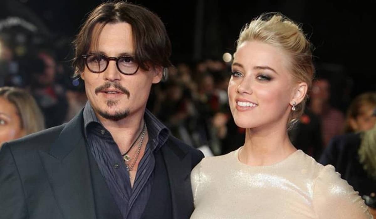 Johnny Depp se diz 'satisfeito' com acordo judicial contra a ex-esposa, Amber Heard